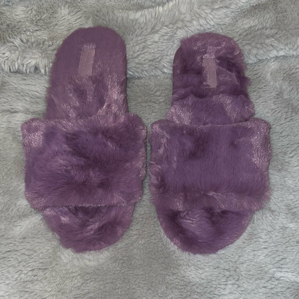 Purple fuzzy slippers by Pink